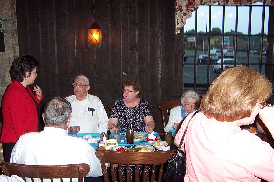 Fred and Bev at moms funeral, with others